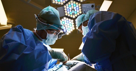 Doctors performing an operation on a patient